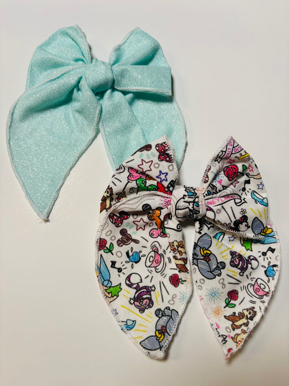 D land + blue glitter Bow- 2 clip bows